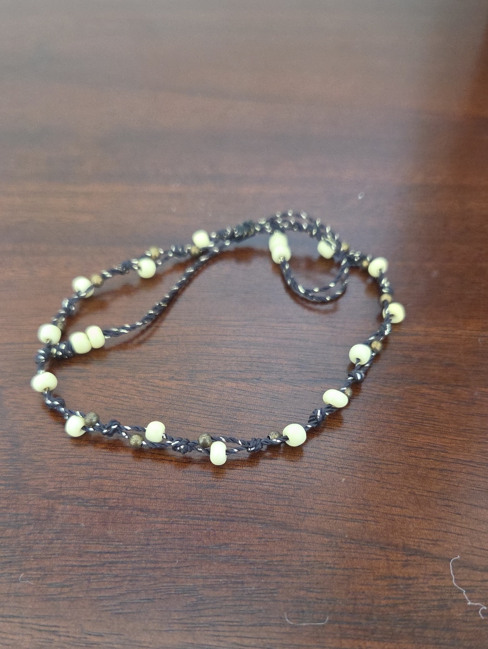 Handcrafted Black Braided Bracelet with Cream Beads